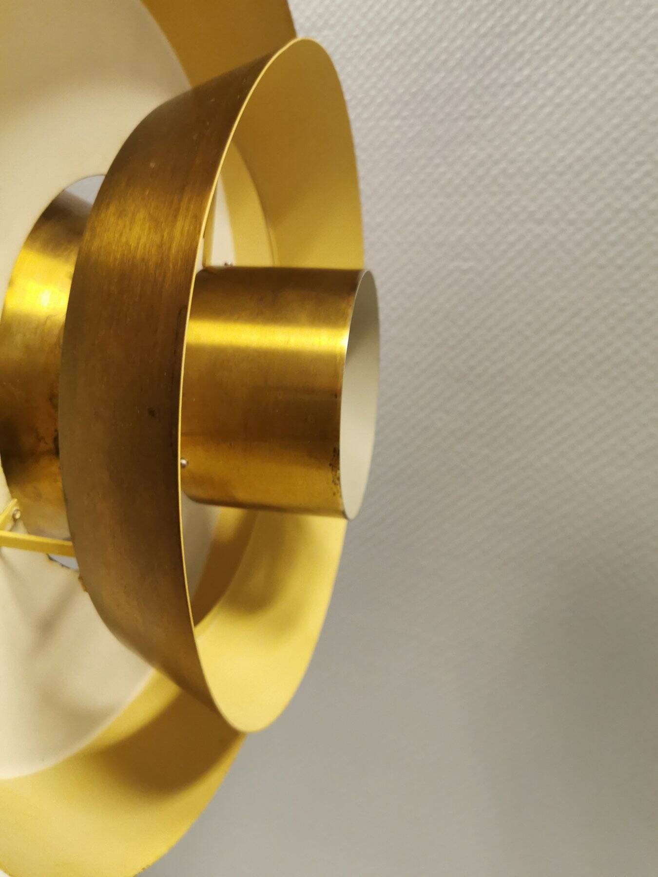 A mid-century Danish hanging lamp in solid brass by Jo Hammerborg for Fog & Mørup.