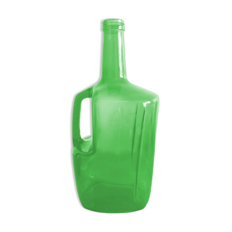 Demijohn in green glass
