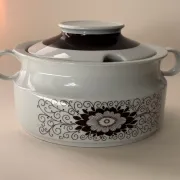 Porcelain soup tureen by Winterling, decorated with brown flowers.