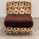 Vintage armchair from the 70s in beige and brown.