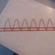 Red wire coat/shoe rack