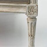 Louis XVI style canapé, in white lacquered wood.