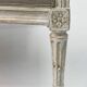 Louis XVI style canapé, in white lacquered wood.