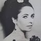 Signed photograph of Elizabeth Taylor, framed silver print 32x37 cm.