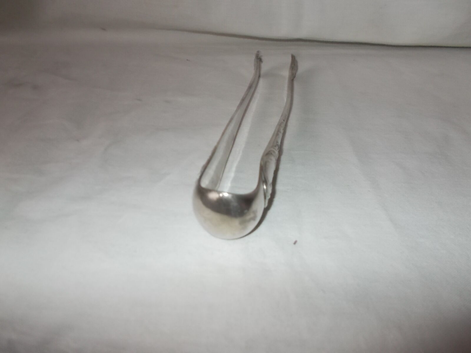 Silver metal sugar pinch