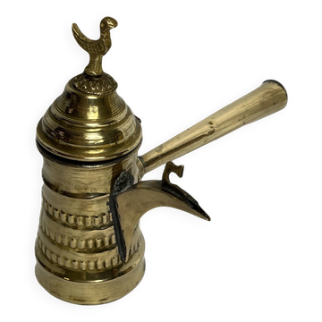 Brass dallah coffee pot with bird-shaped finial, 20th century.