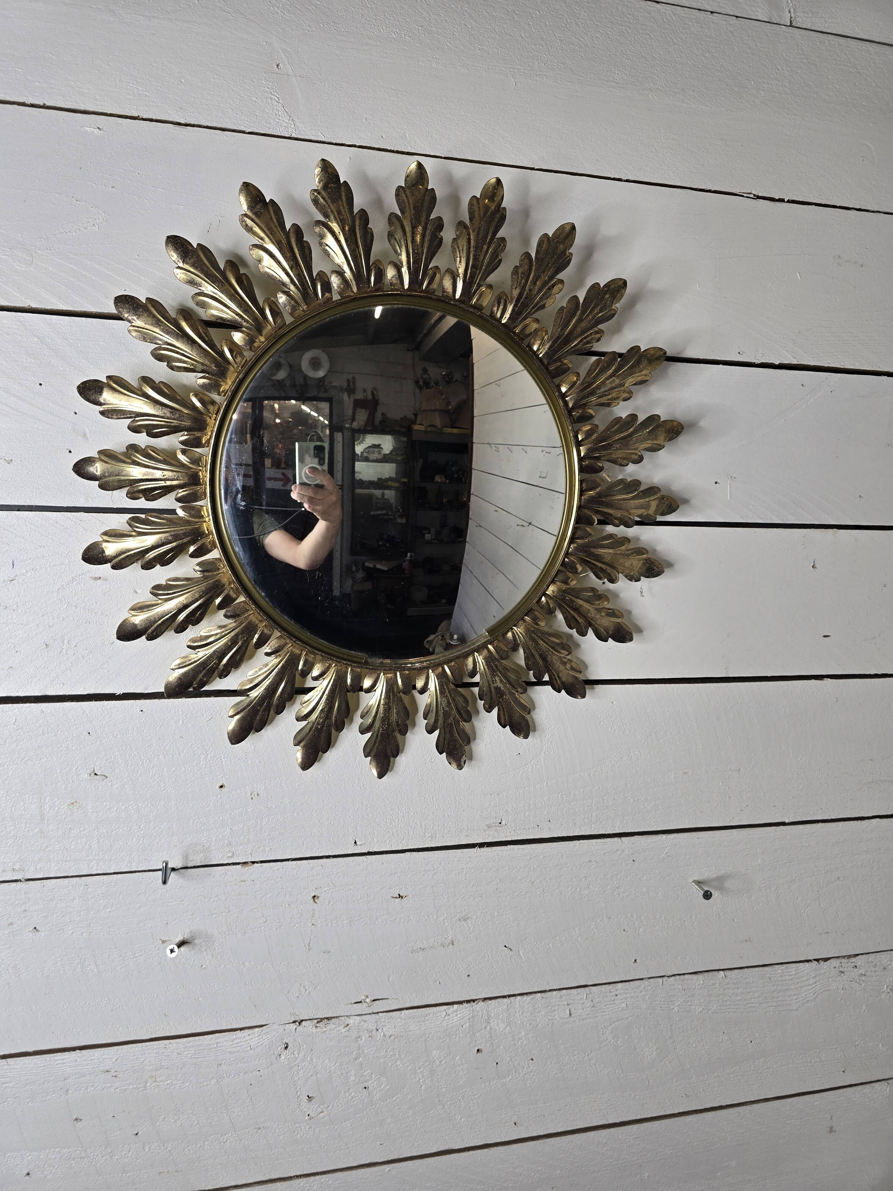 Witch's eye sun mirror in gold metal from the 60s