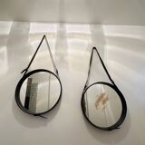 Jacques Adnet pair of circular leather and brass mirrors