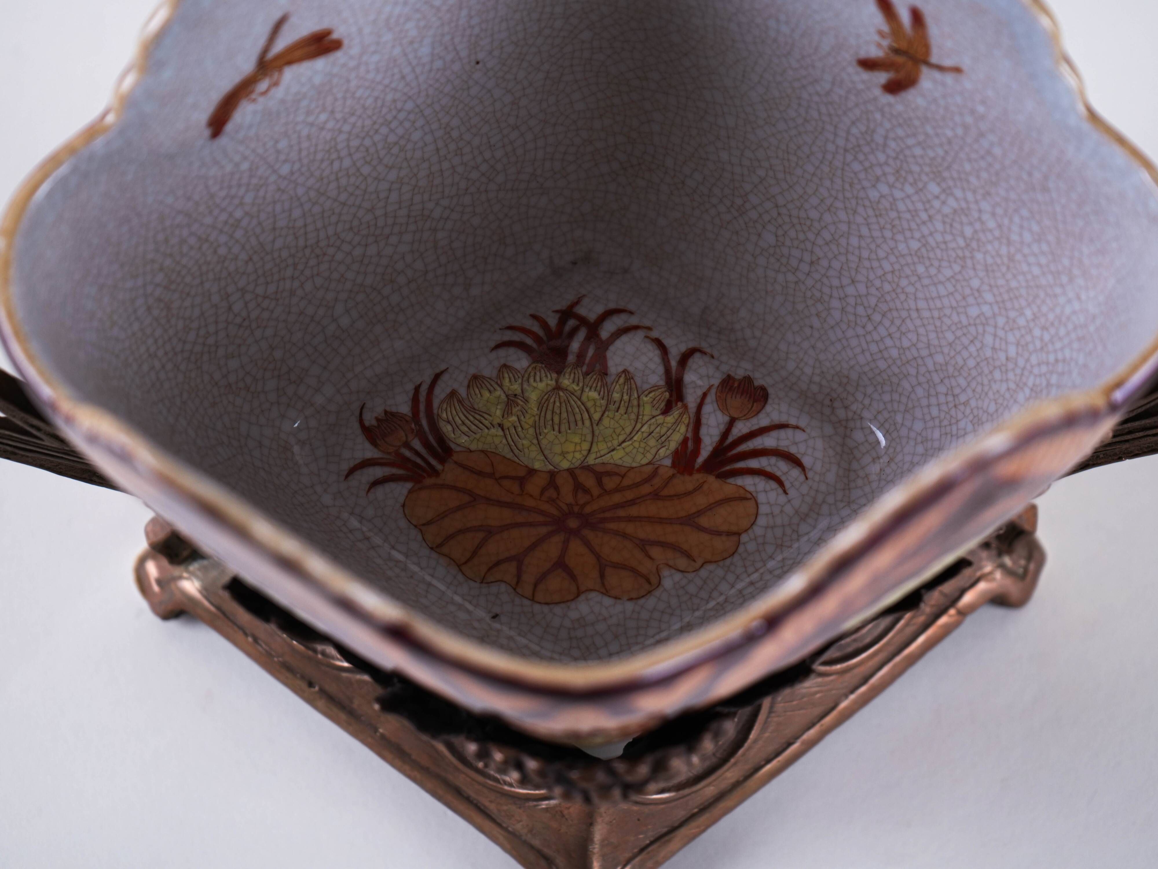 Art Nouveau ceramic platter in gilded basket with grapevine motif, Europe