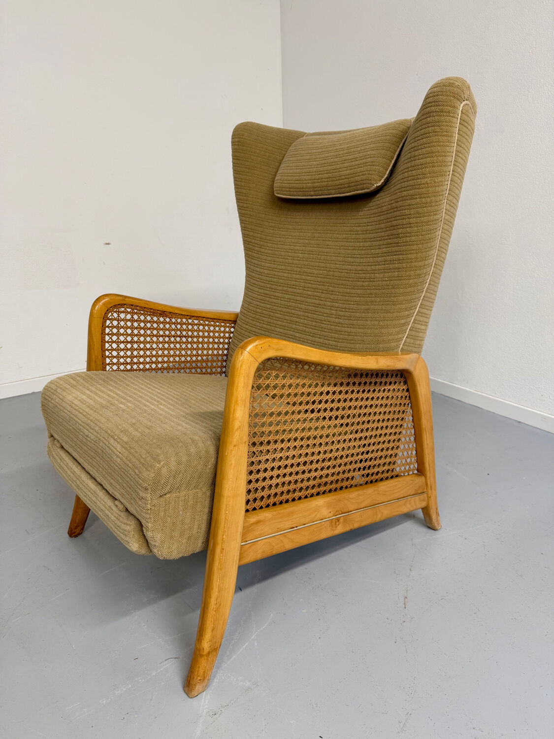 Vintage wingback recliner in Scandinavian design from the 1960s.