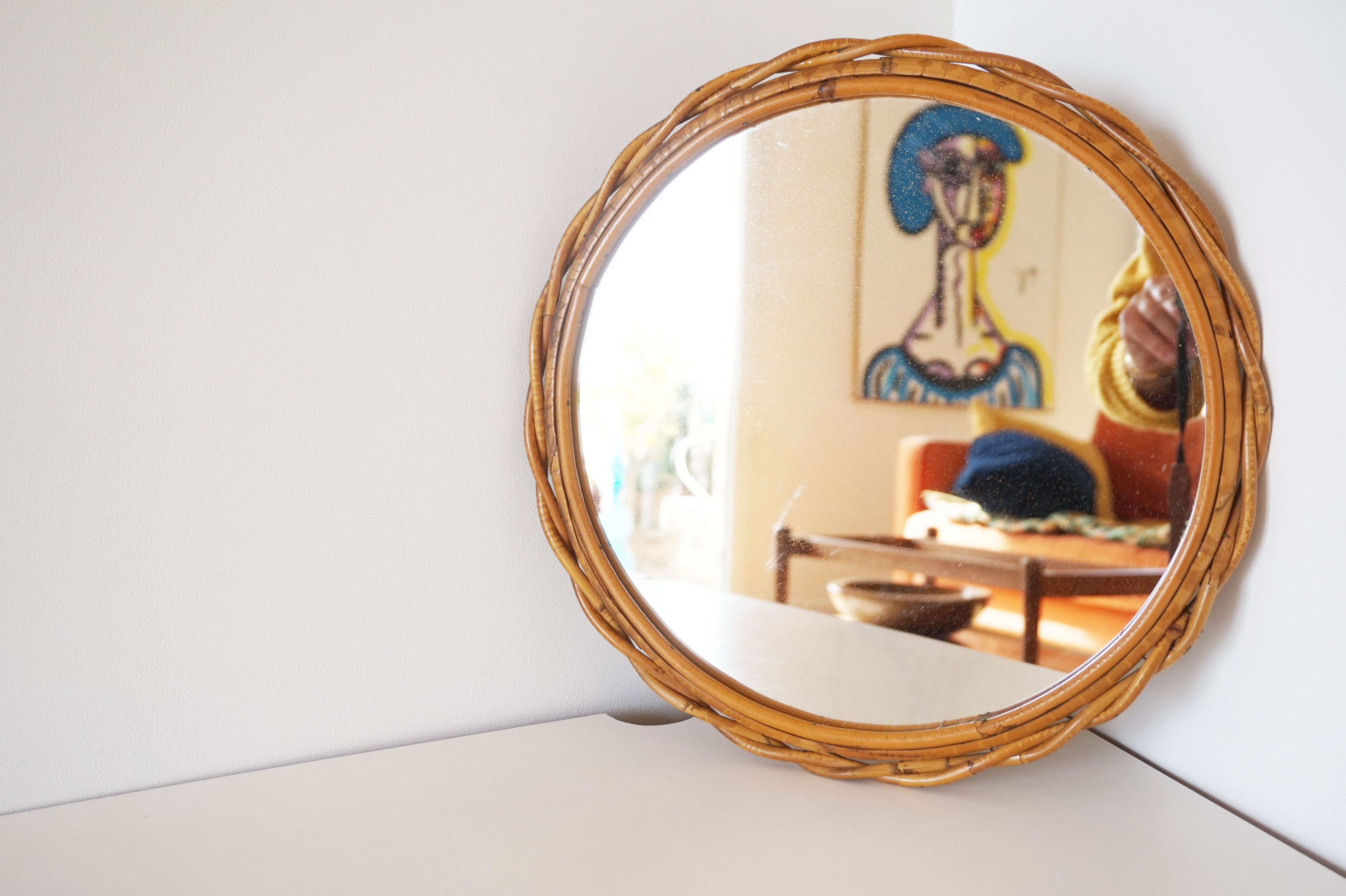 Vintage rattan sun mirror