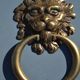 4 antique lion head furniture handles from La Samaritaine.