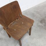Atypical 1960s curved wood children's chair