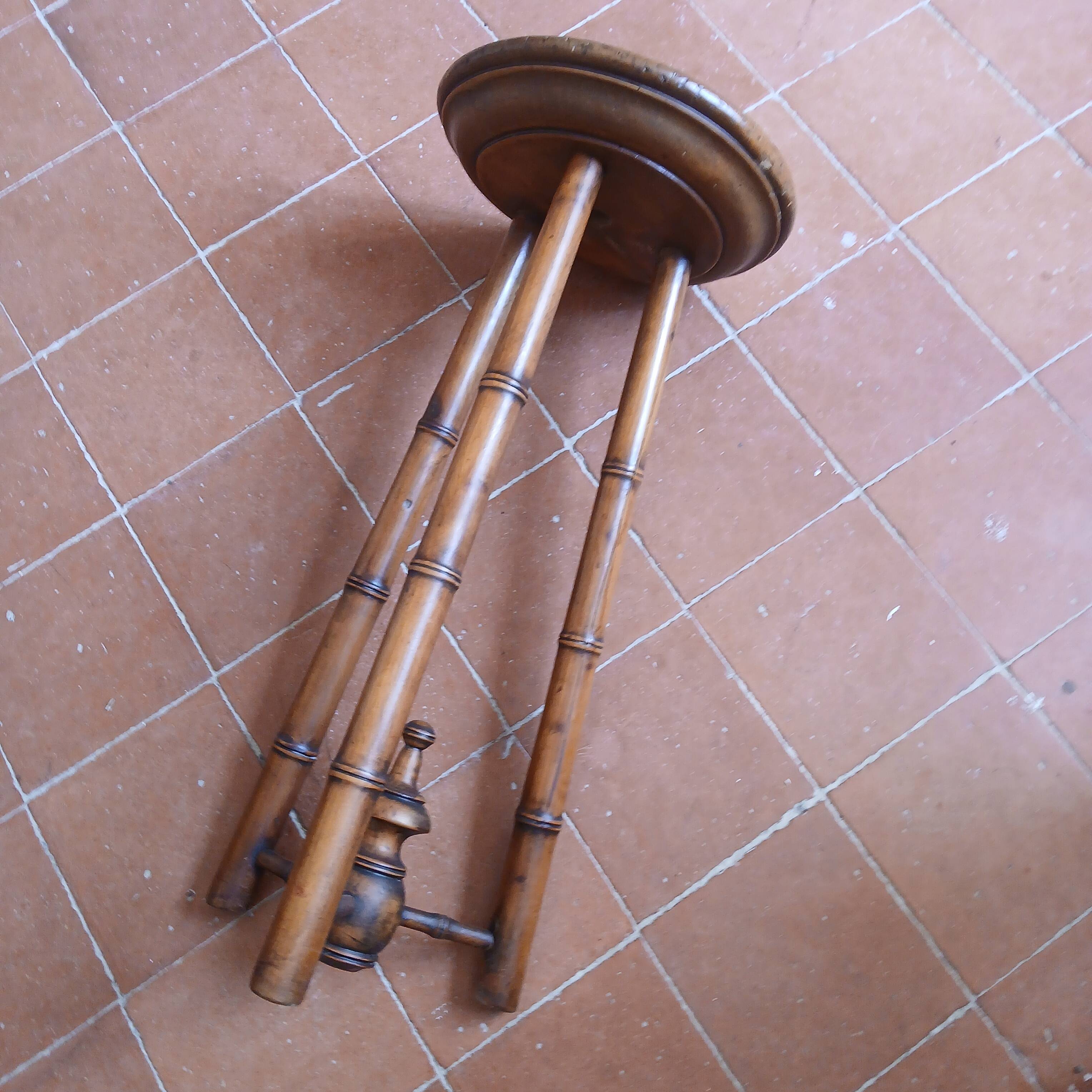 Turned wooden tripod stool