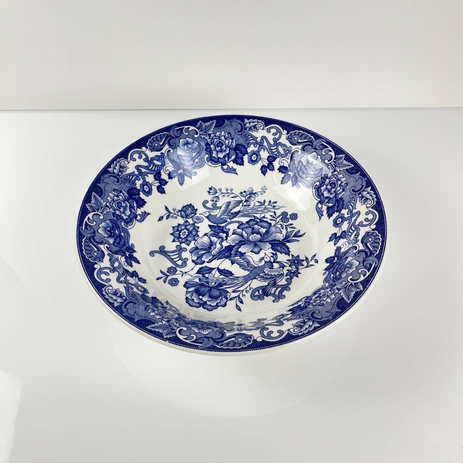 Blue earthenware salad bowl with floral and bird decoration, early 20th century