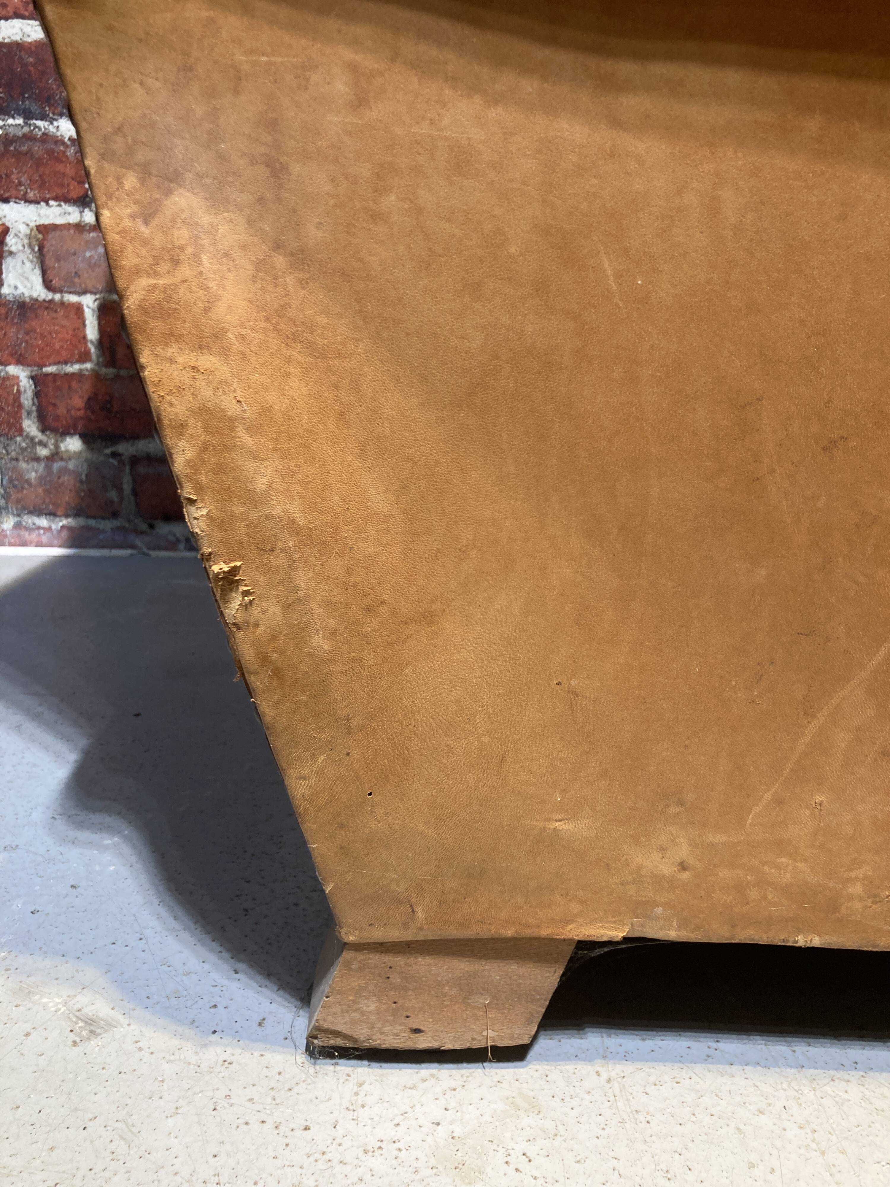 Brown leather armchair