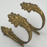 Paire de porte-embrasses en bronze dorée style Rocaille