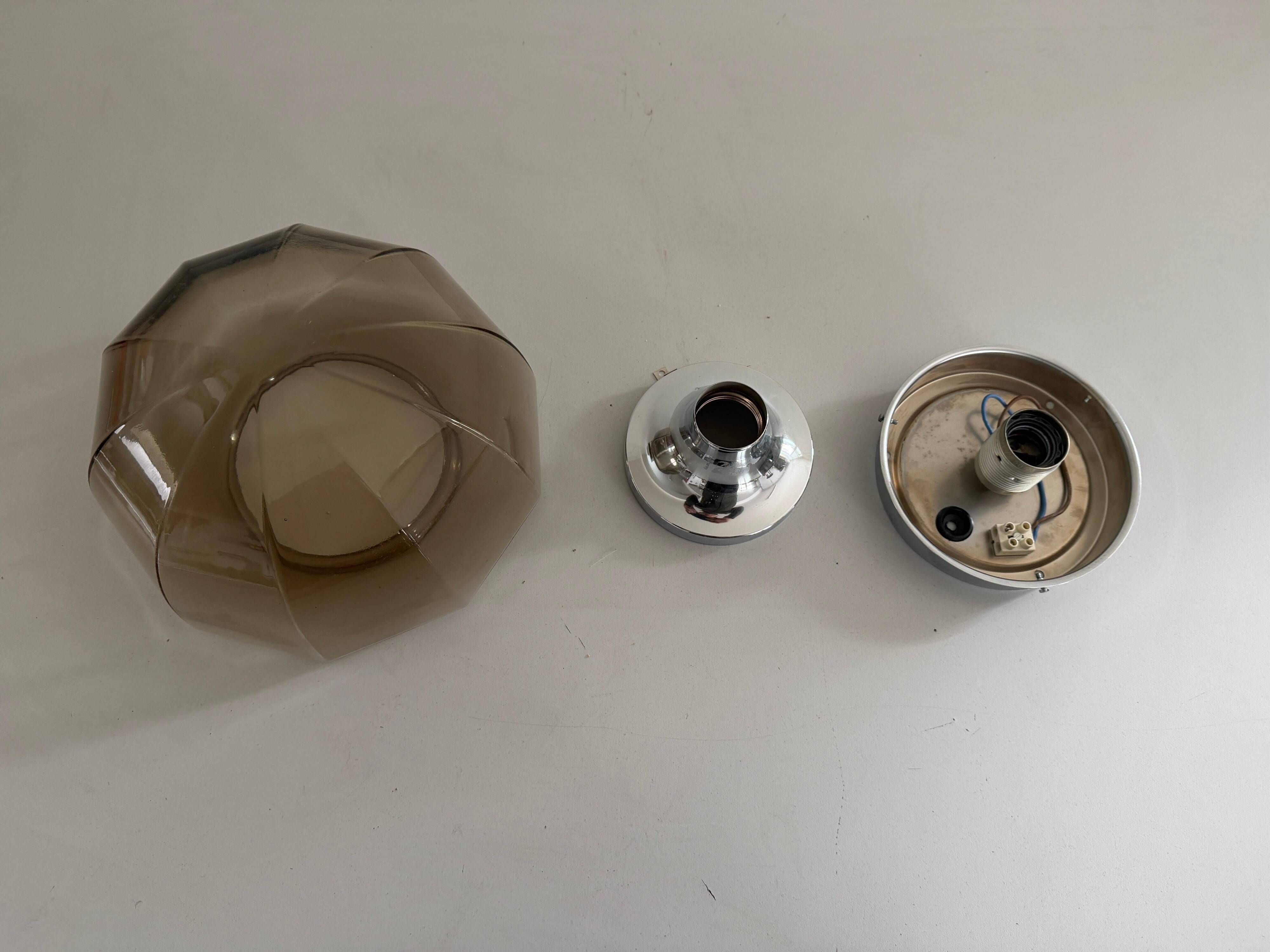 Flush-mounted brown glass fixture and metal base by N Leuchten, 1960s, Germany.