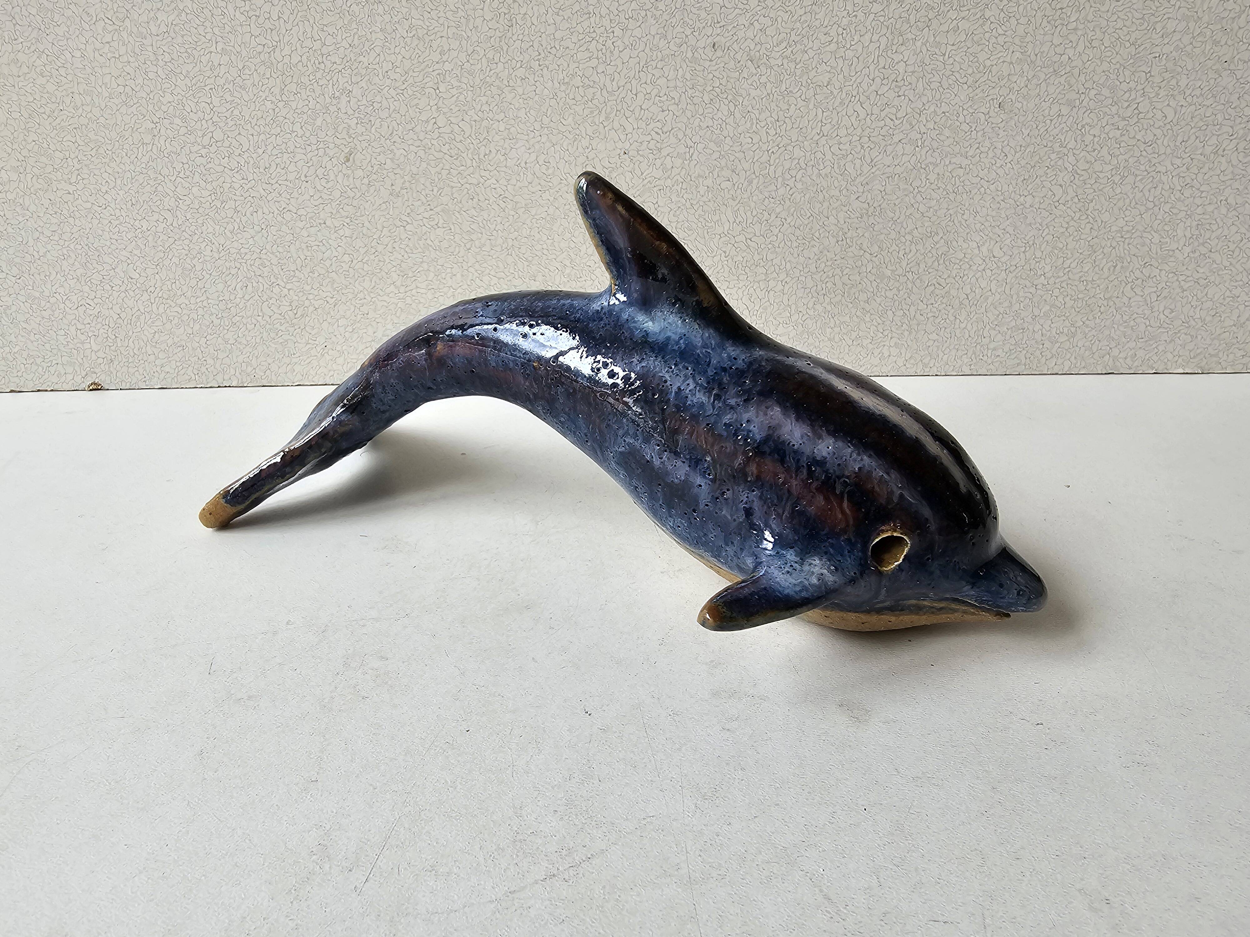 Signed blue ceramic dolphin sculpture (Signature to be identified)