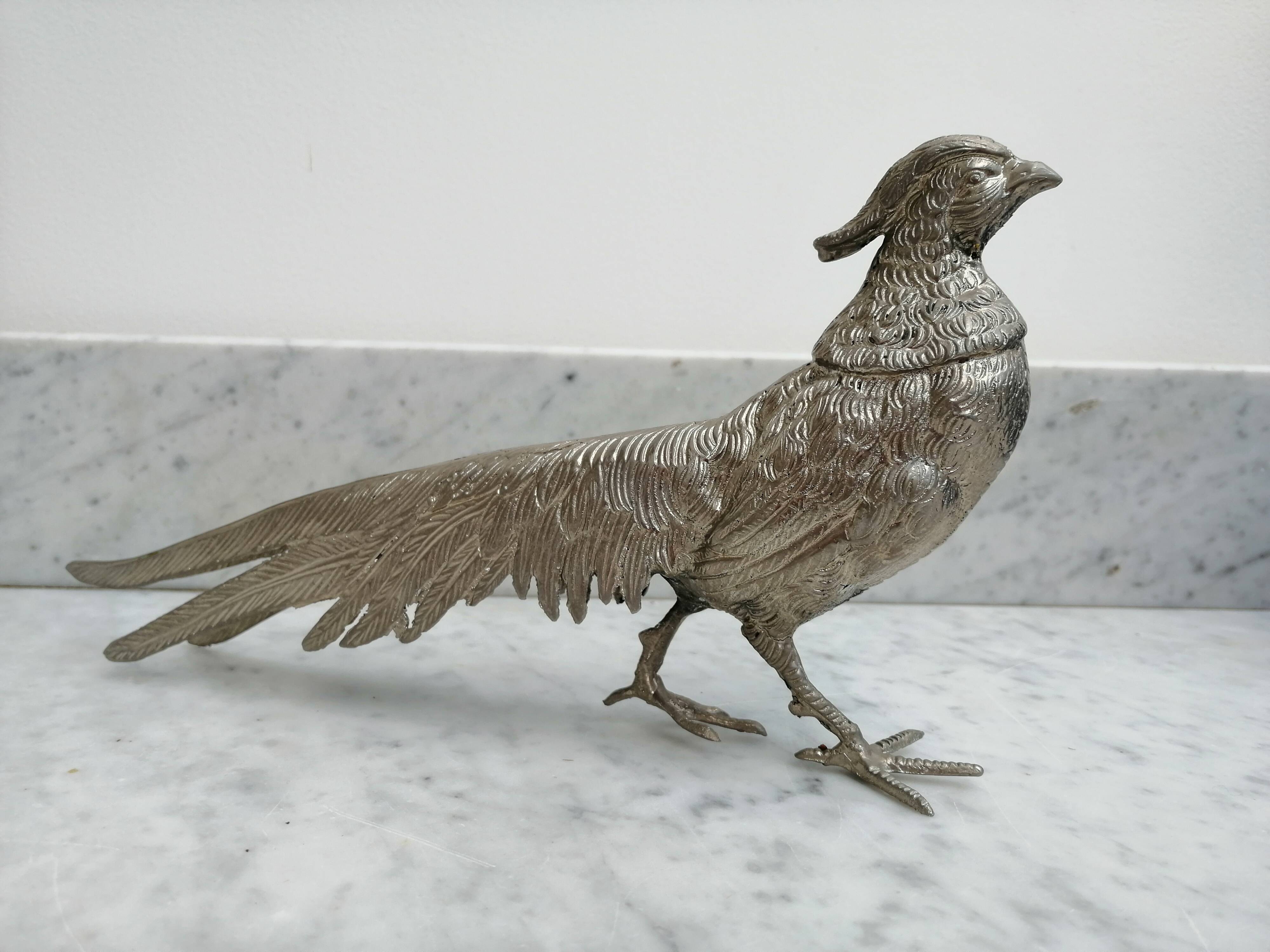 Couple of silver metal pheasants