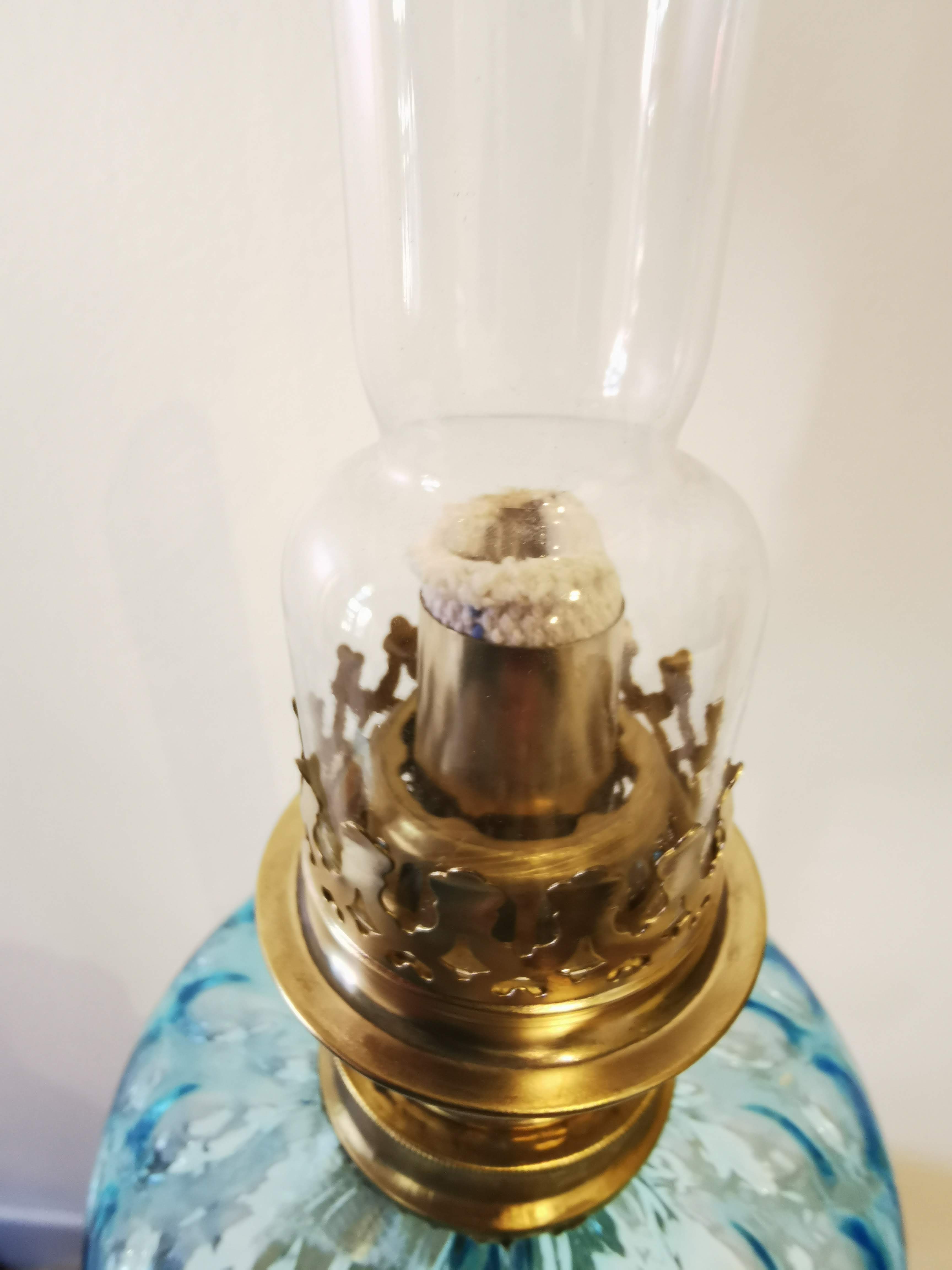 Large kerosene lamp mounted on bronze statue. Late nineteenth century