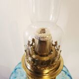 Large kerosene lamp mounted on bronze statue. Late nineteenth century