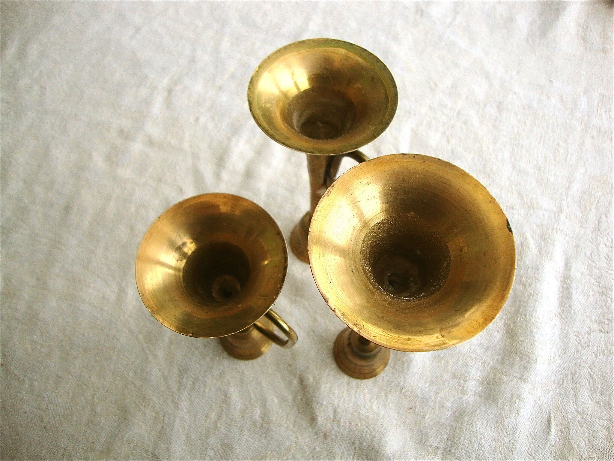 3 brass trumpet candlesticks