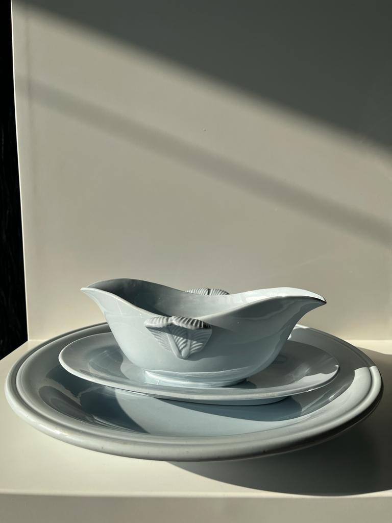 Flat set and light blue saucière earthenware from Montereau