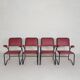 Set of 4 armchairs and a coffee table with tubular structure in Bauhaus style, 1950s.