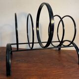 Metal magazine rack attributed to Charlotte Perriand