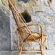 Large rattan armchair with armrests - vintage 1960
