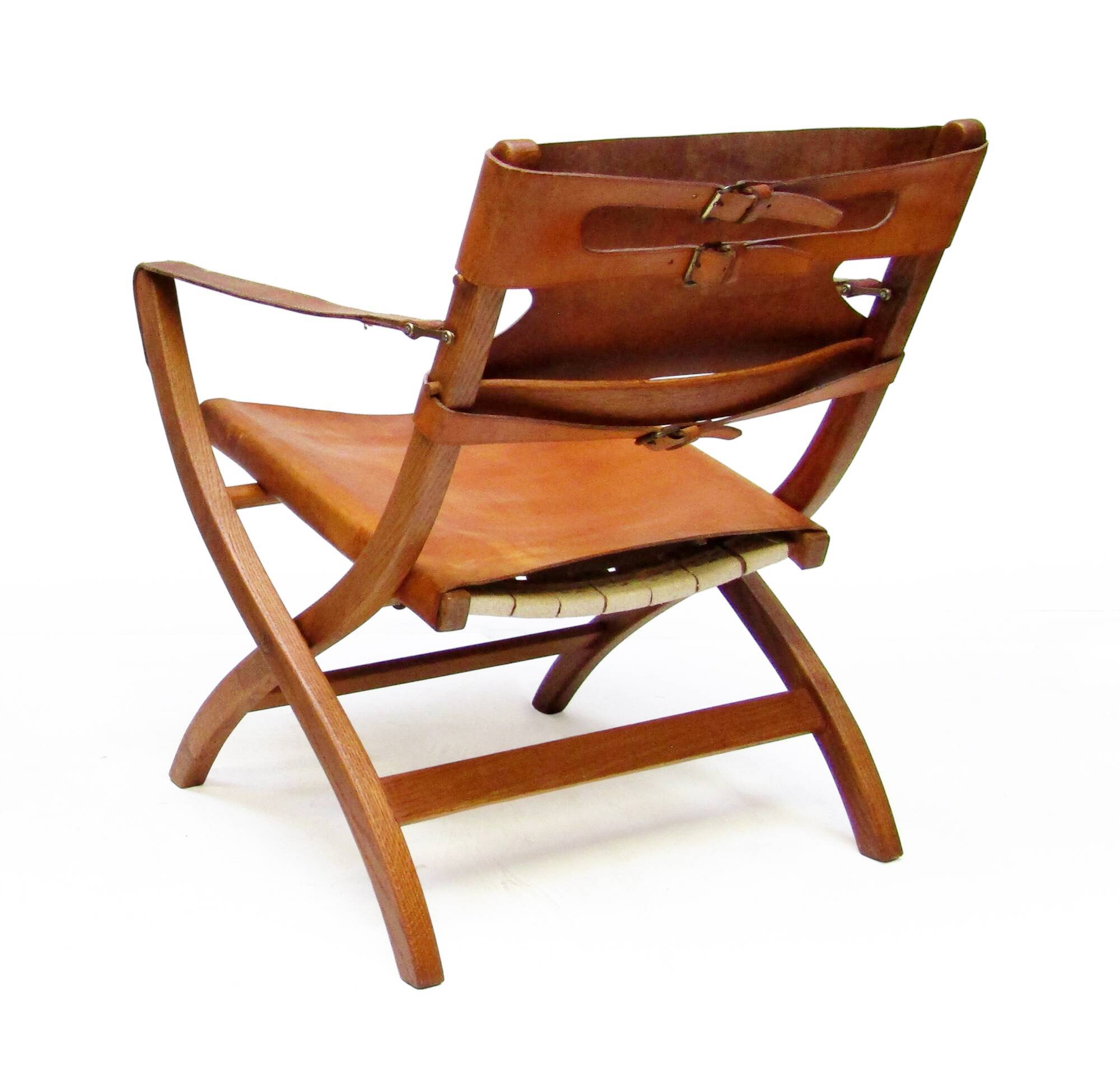 Two 1950s Danish Safari Chairs In Oak & Hide Leather by Poul Hundevad