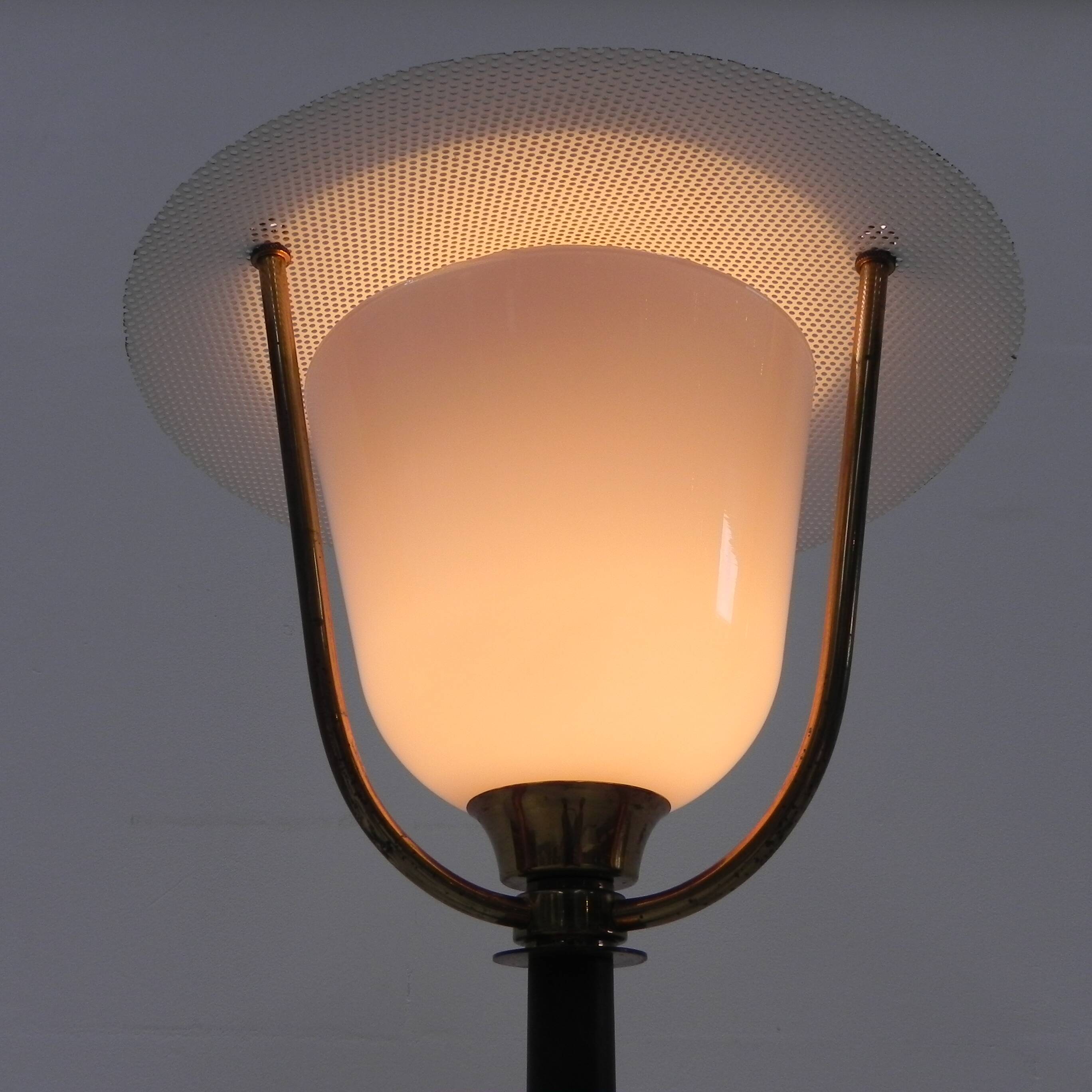 Standing vintage lamp with glass shade and perforated steel shade