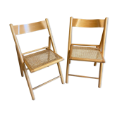 Pair of folding wooden chairs and vintage cannage