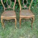 Pair of solid oak chairs with caned seats - 1930s