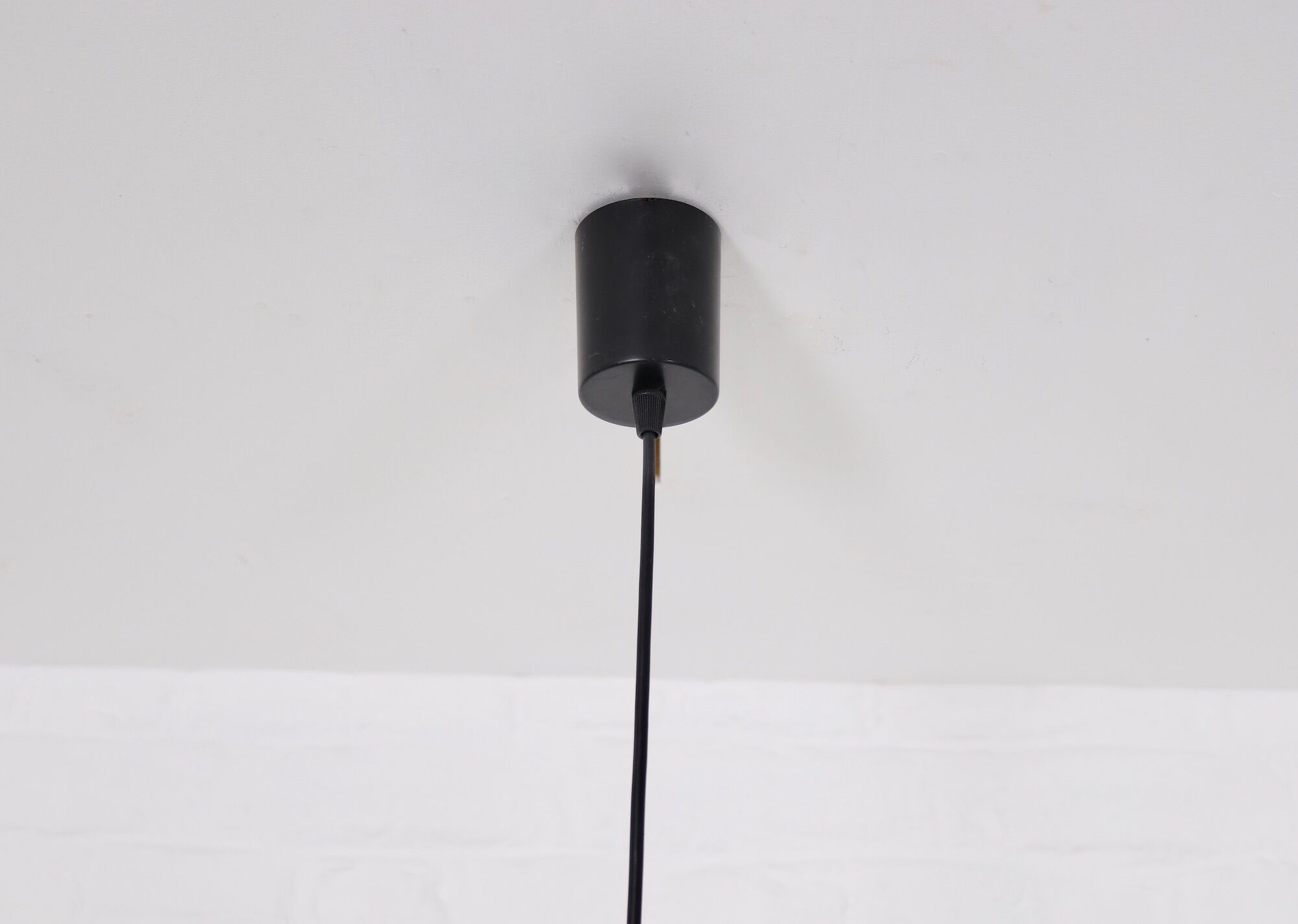 Curtained glass globe suspension