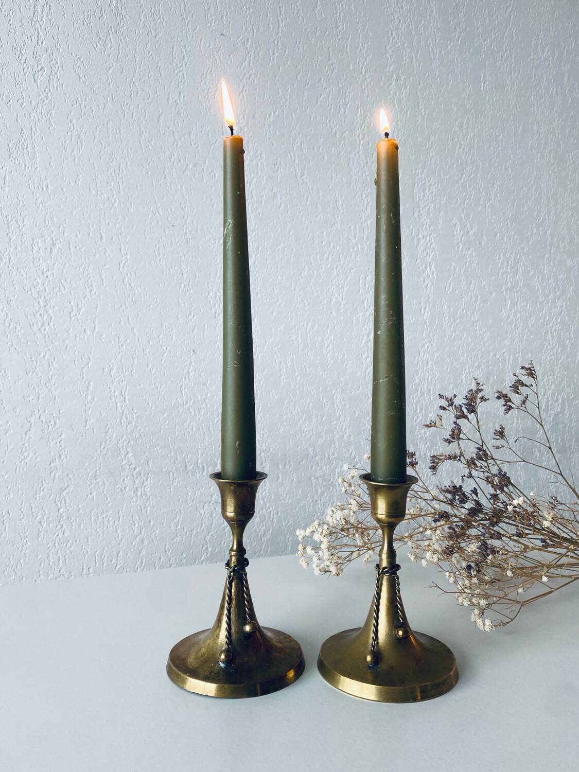 Pair of brass cord candle holders