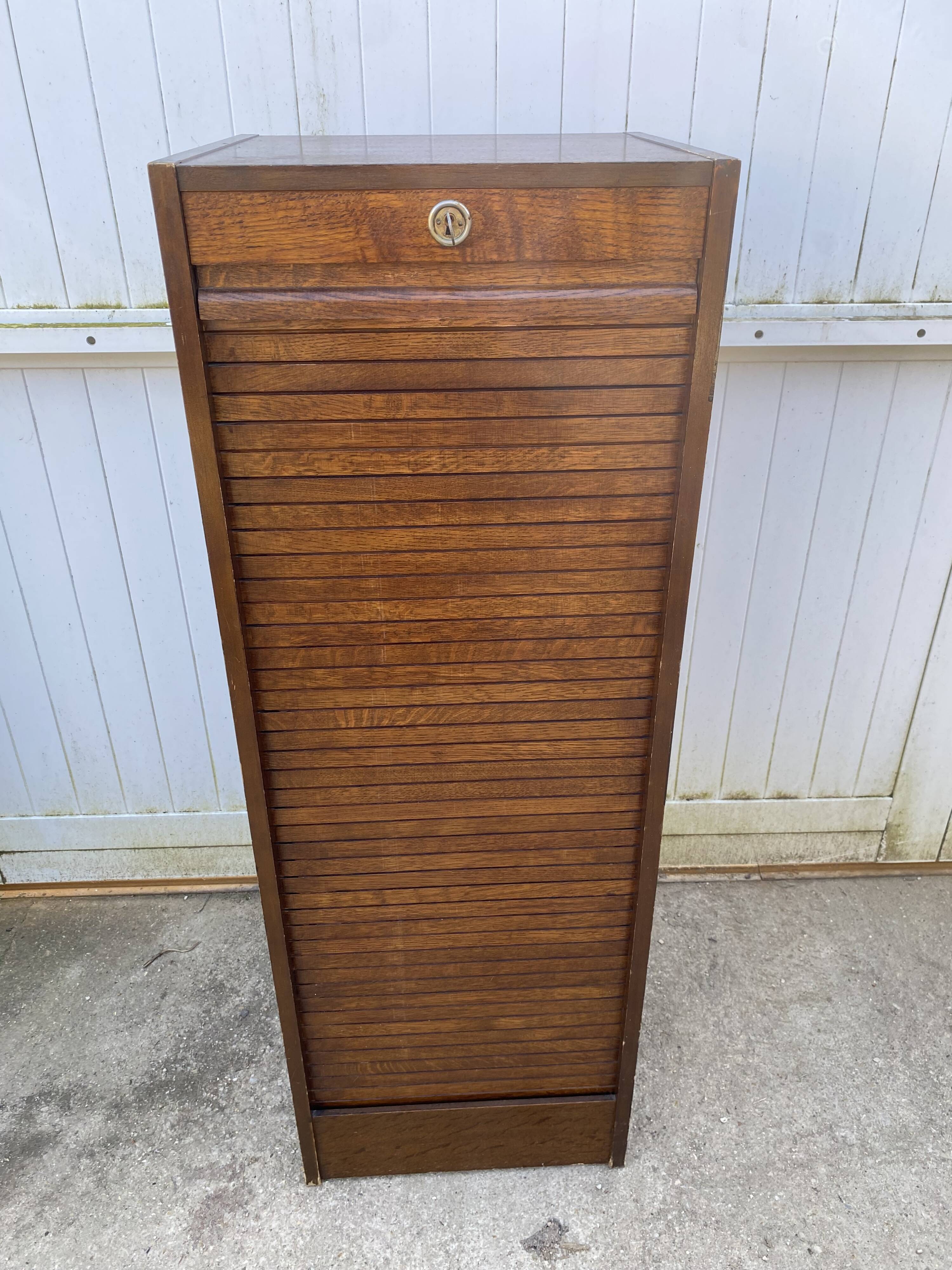 1970 oak office storage cabinet with curtains.