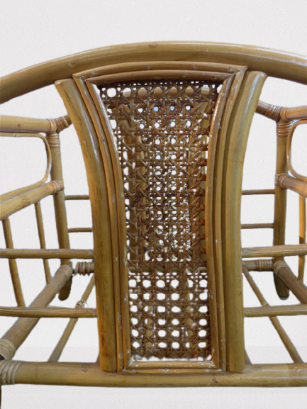 Wicker rattan magazine rack with vintage caning