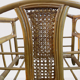 Wicker rattan magazine rack with vintage caning