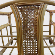 Wicker rattan magazine rack with vintage caning