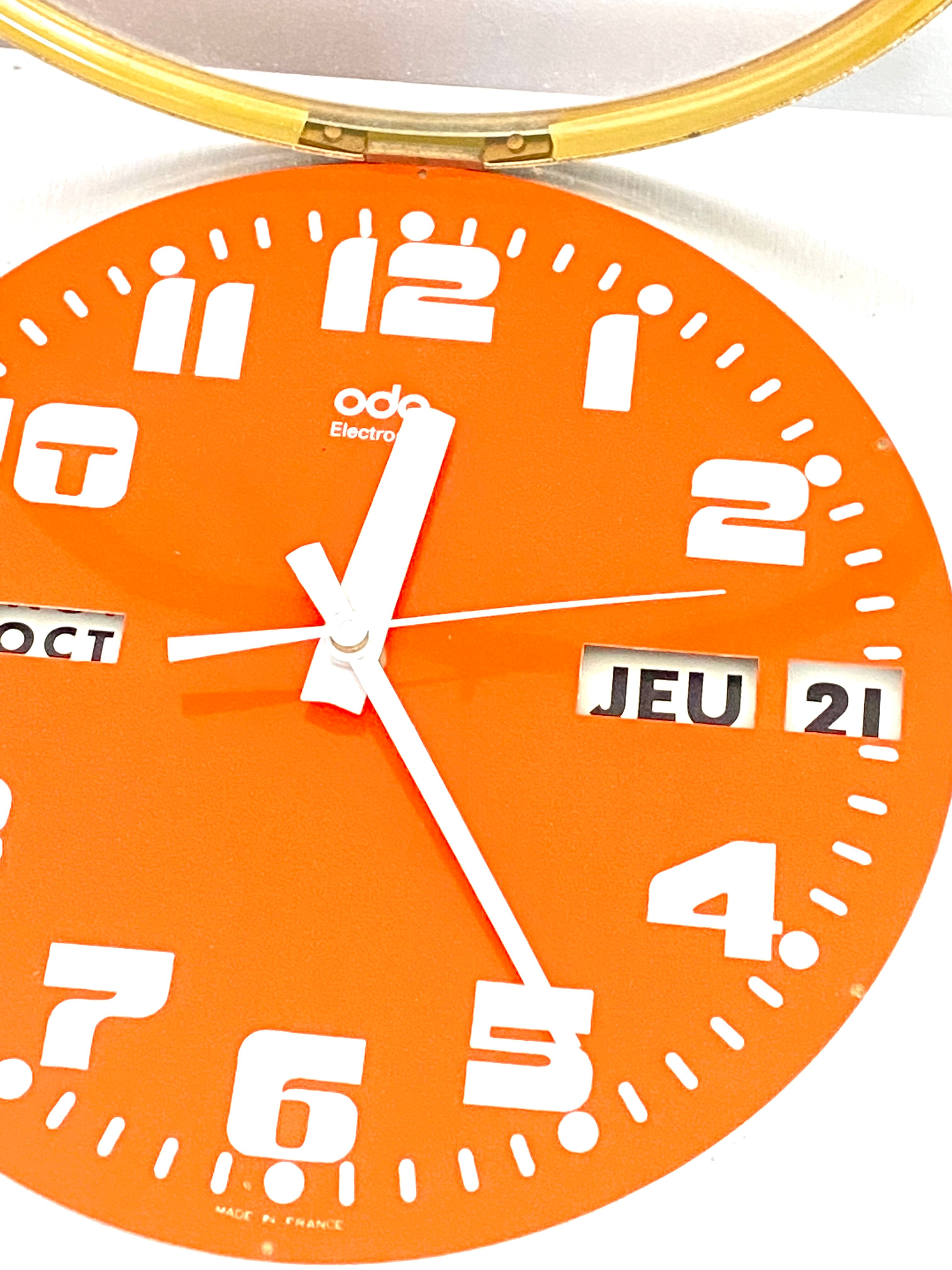 Vintage orange wall clock