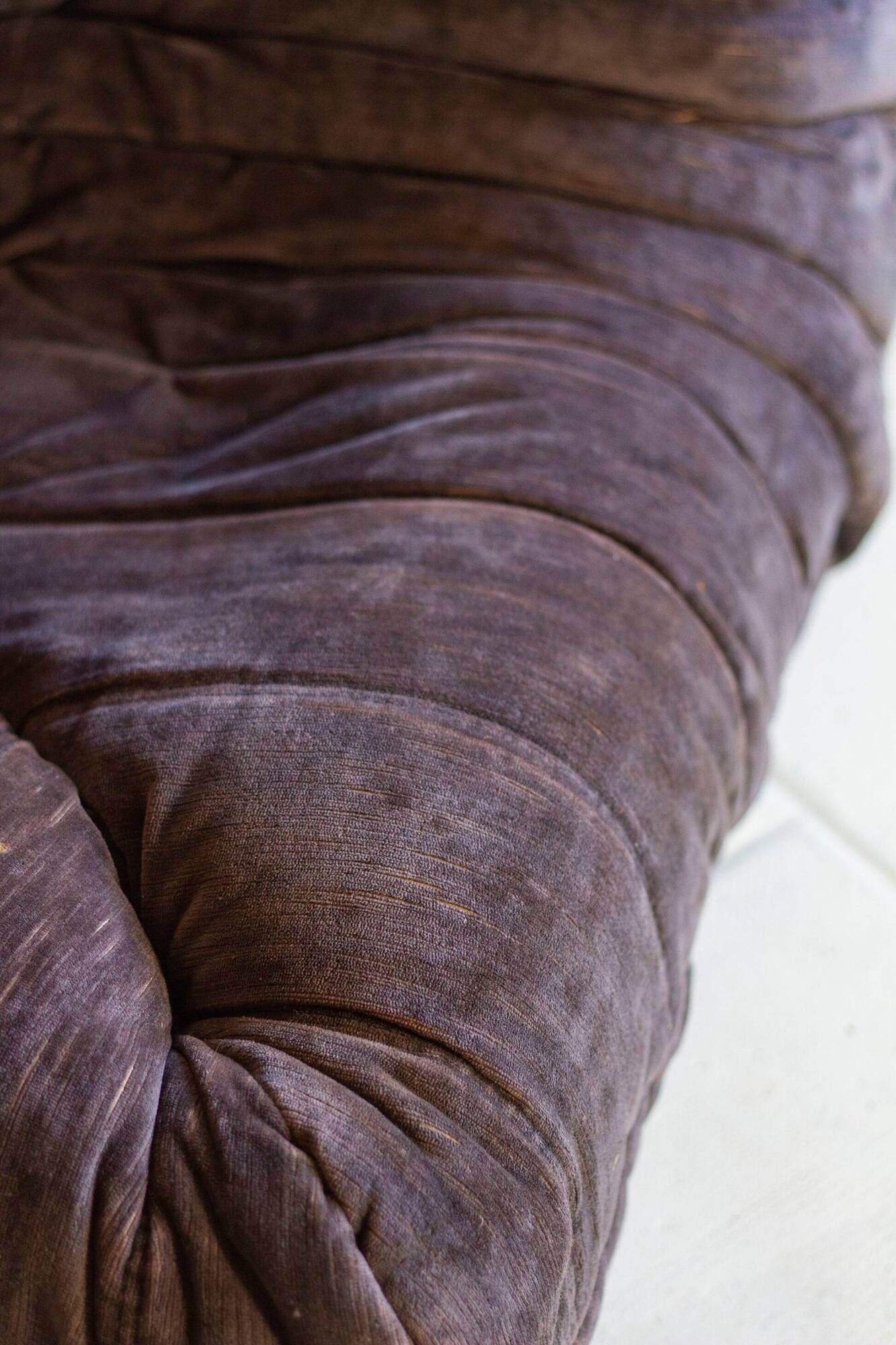 Togo aubergine corner armchair by Michel Ducaroy for Ligne Roset