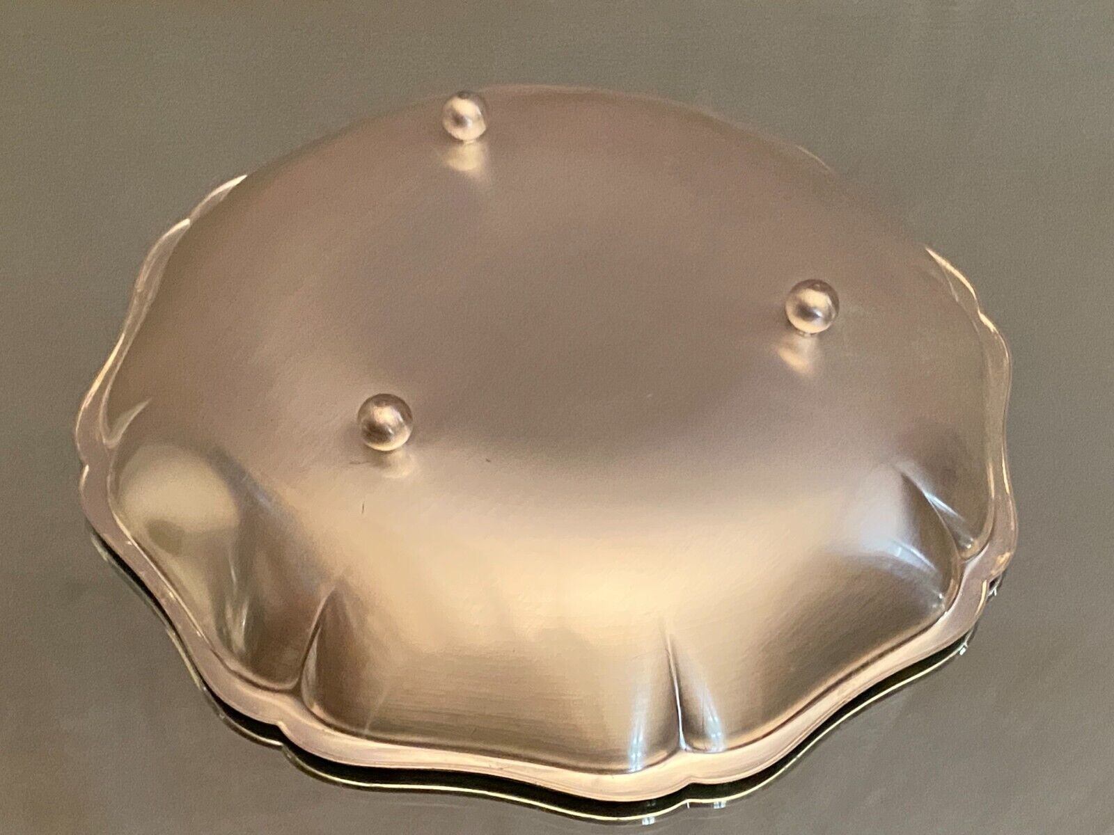 Metal dish with starry decoration