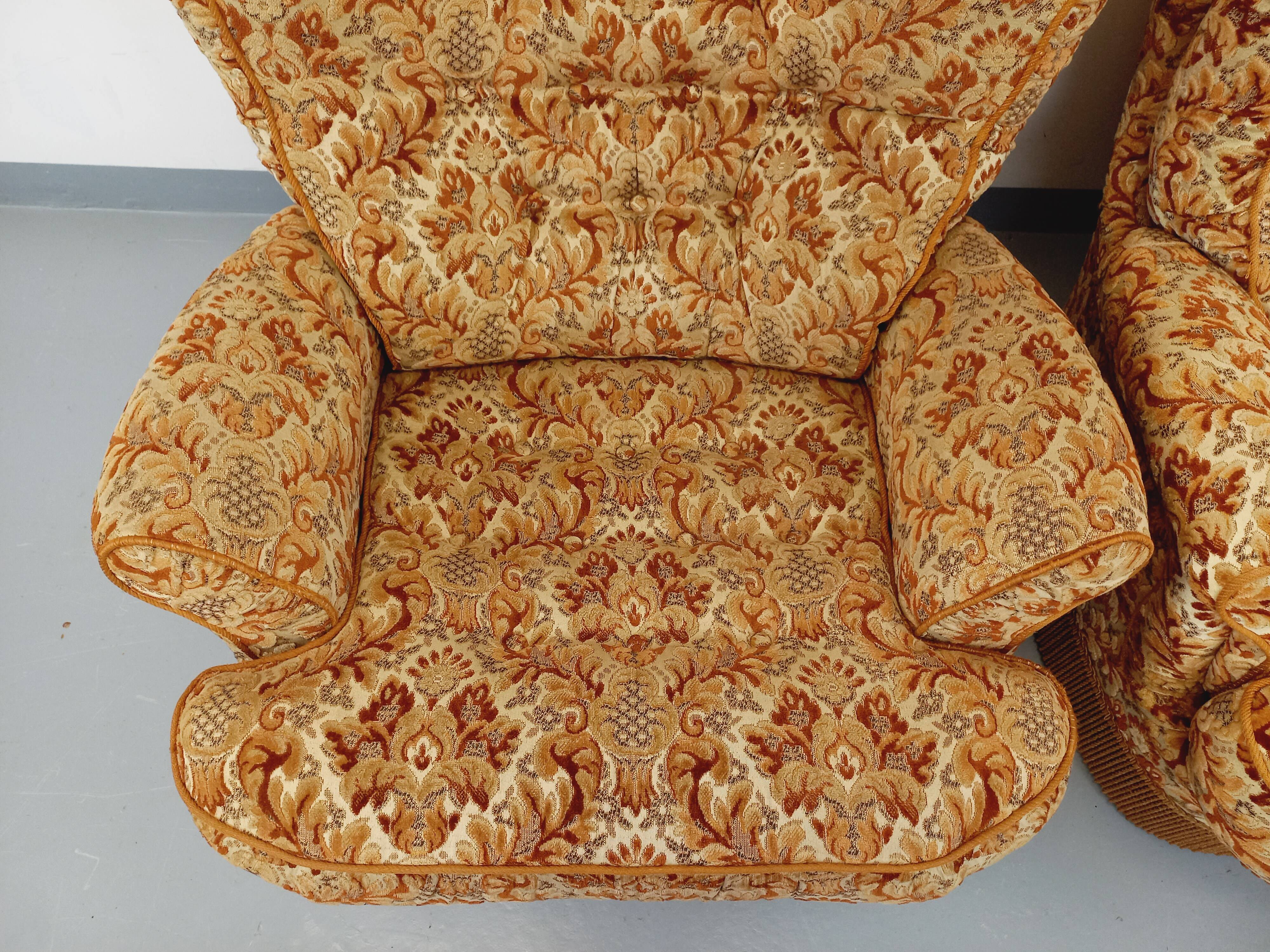 Set of 2 vintage armchairs in floral fabric with fringes from the 60s 70s