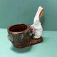 Ceramic rabbit pot from the early 20th century.