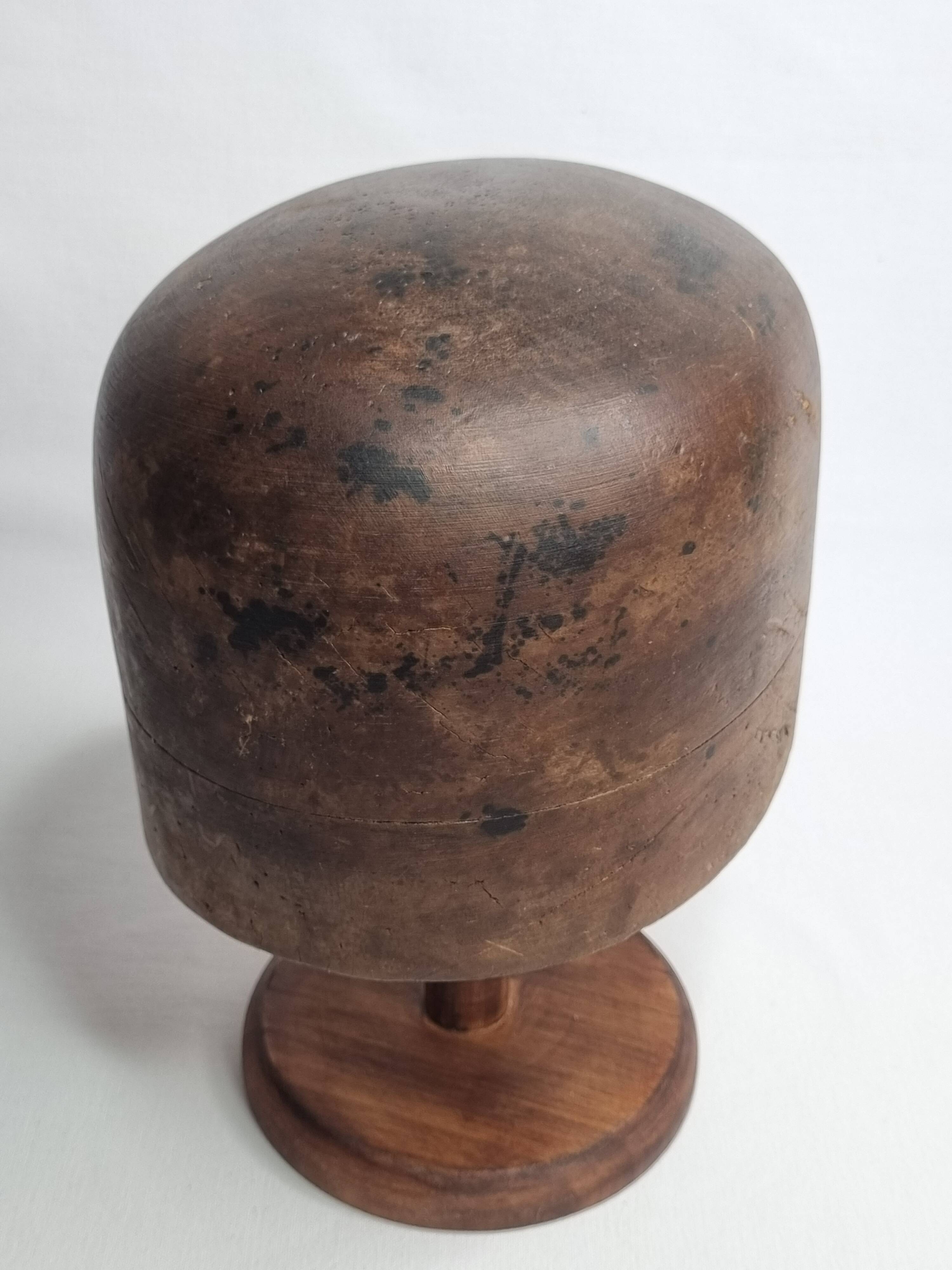 Standing wooden hat shape, 1900