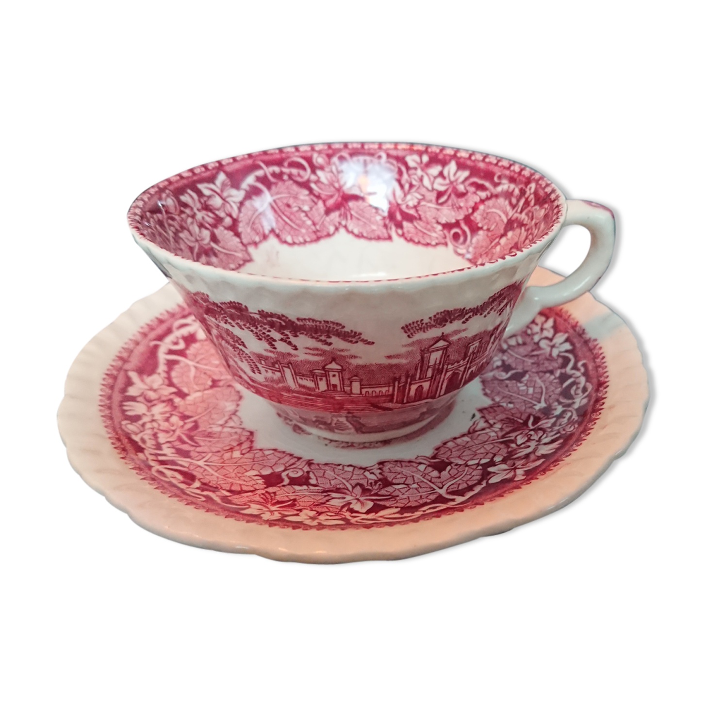 Tea cup and English earthenware saucer