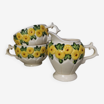 Sunflower flower cups and milk jug
