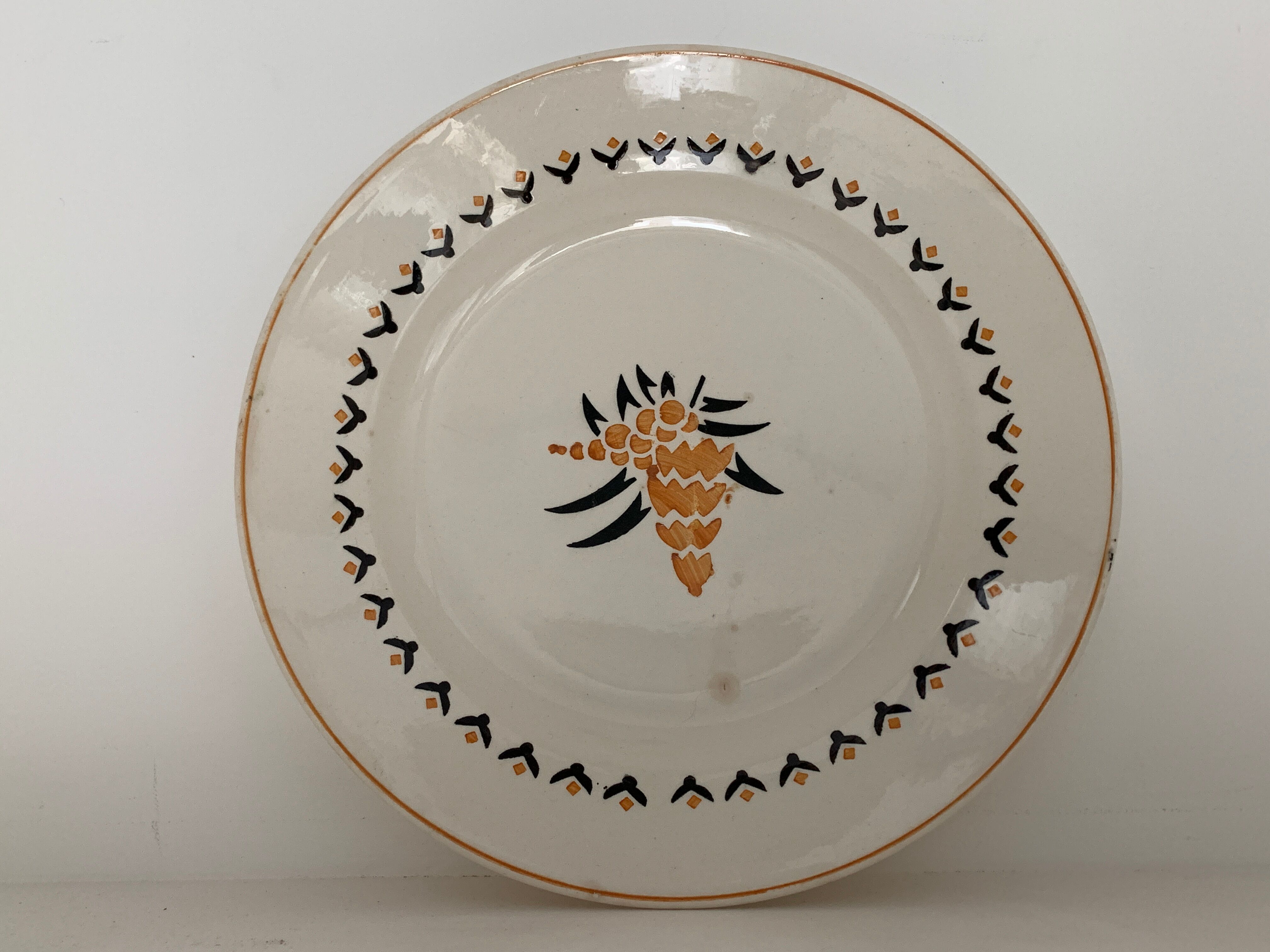 7 dessert plates and one Longwy dish
